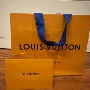 Louis Vuitton Orange Bag with Blue Handles